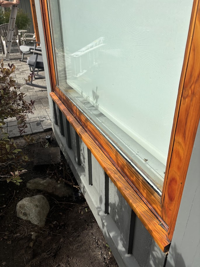 After - logs restored, stained and protected