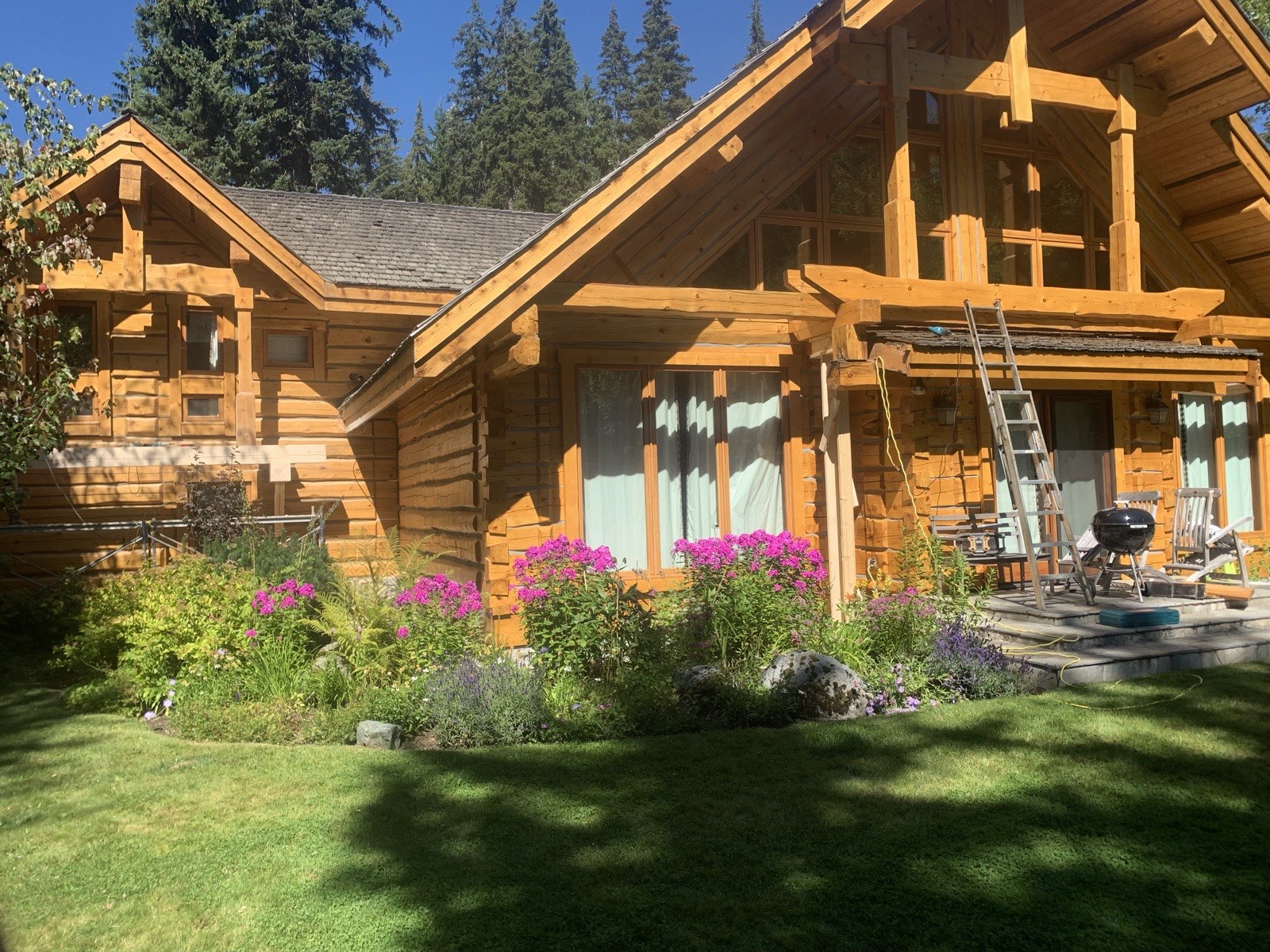 Log home restoration Whistler BC - finished log home exterior with fresh stain